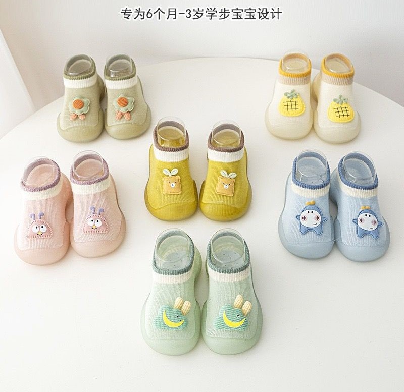Colorful baby shoes in various designs